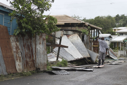 Mandatory Credit: Photo by AP/REX/Shutterstock (9044834a) A man surveys the wreckage on his property after the passing of Hurricane Irma, in St. John's, Antigua and Barbuda, . Heavy rain and 185-mph winds lashed the Virgin Islands and Puerto Rico's northeast coast as Irma, the strongest Atlantic Ocean hurricane ever measured, roared through Caribbean islands on its way to a possible hit on South Florida Antigua Hurricane Irma - 06 Sep 2017