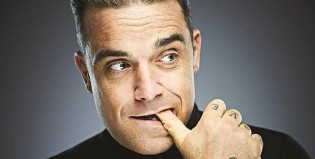 Robbie Williams se reencuetra con Take That en el escenario